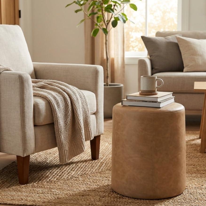 imageHomePop Upholstered Faux Leather Round Ottoman No Lid Seat Only HomePop Home Dcor Round Pouf Foot Rest Cream Faux LeatherSand Faux Leather